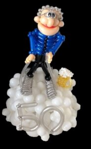 Een ballondecoratie laten maken voor een verjaardags feest"